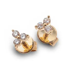 Diamond stud earrings trio.