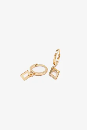 Geometric Diamond Huggie Earrings - Google SEO result: Diamond huggie earrings with geometric design - Shop now!