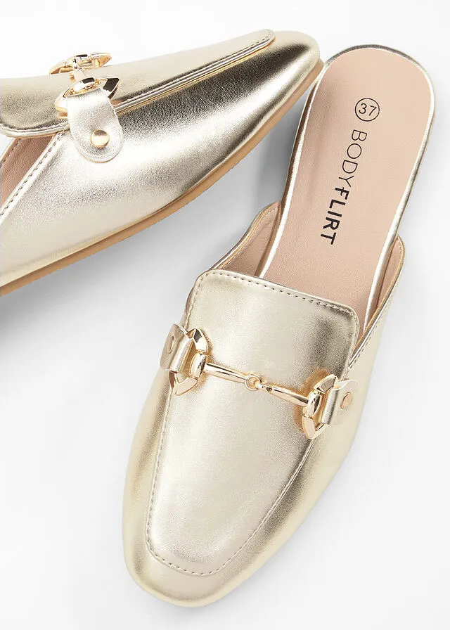 Metallic champagne mules.