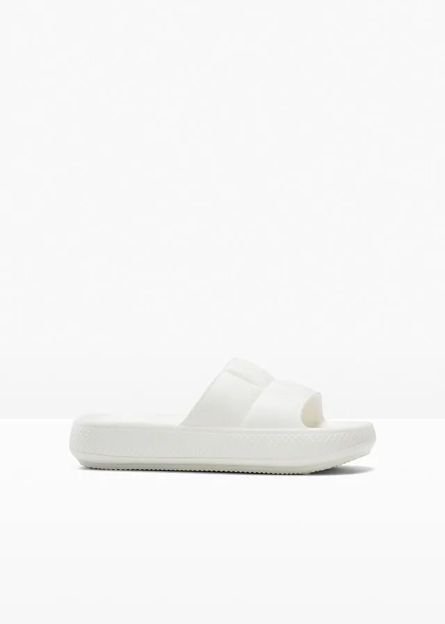 White platform mules.