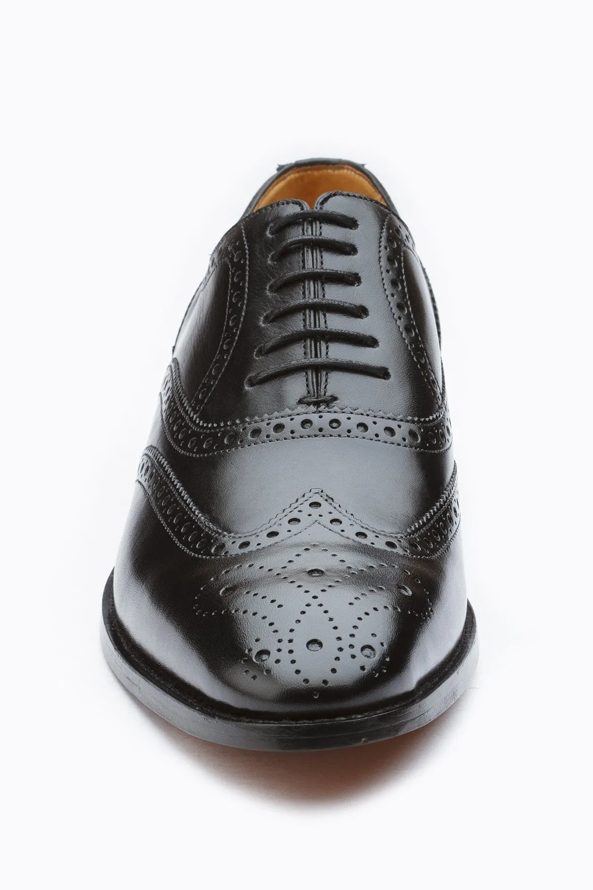 Wingcap Oxford shoes with medallion in black